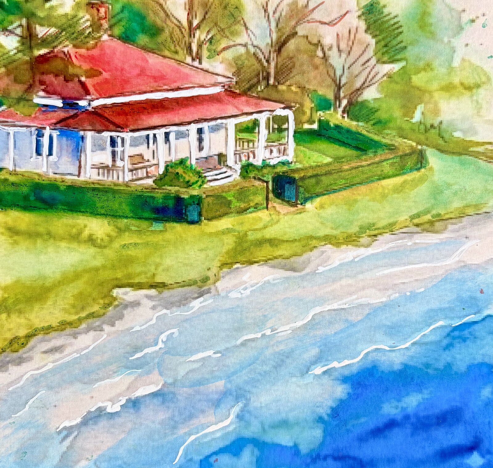 Red-roofed house by the beach